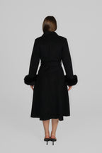 Back view of a long black coat