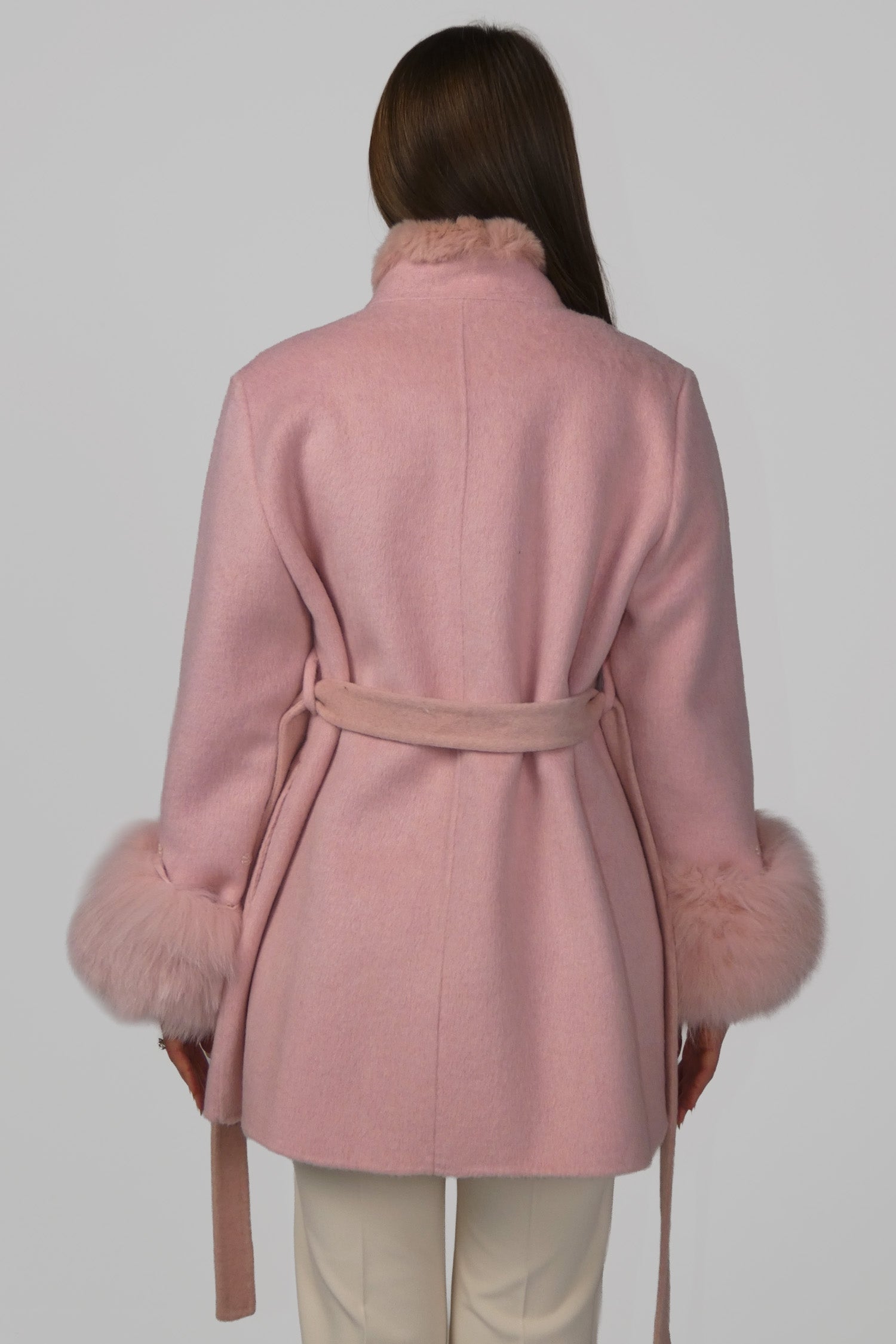 Back view of a pink fur coat